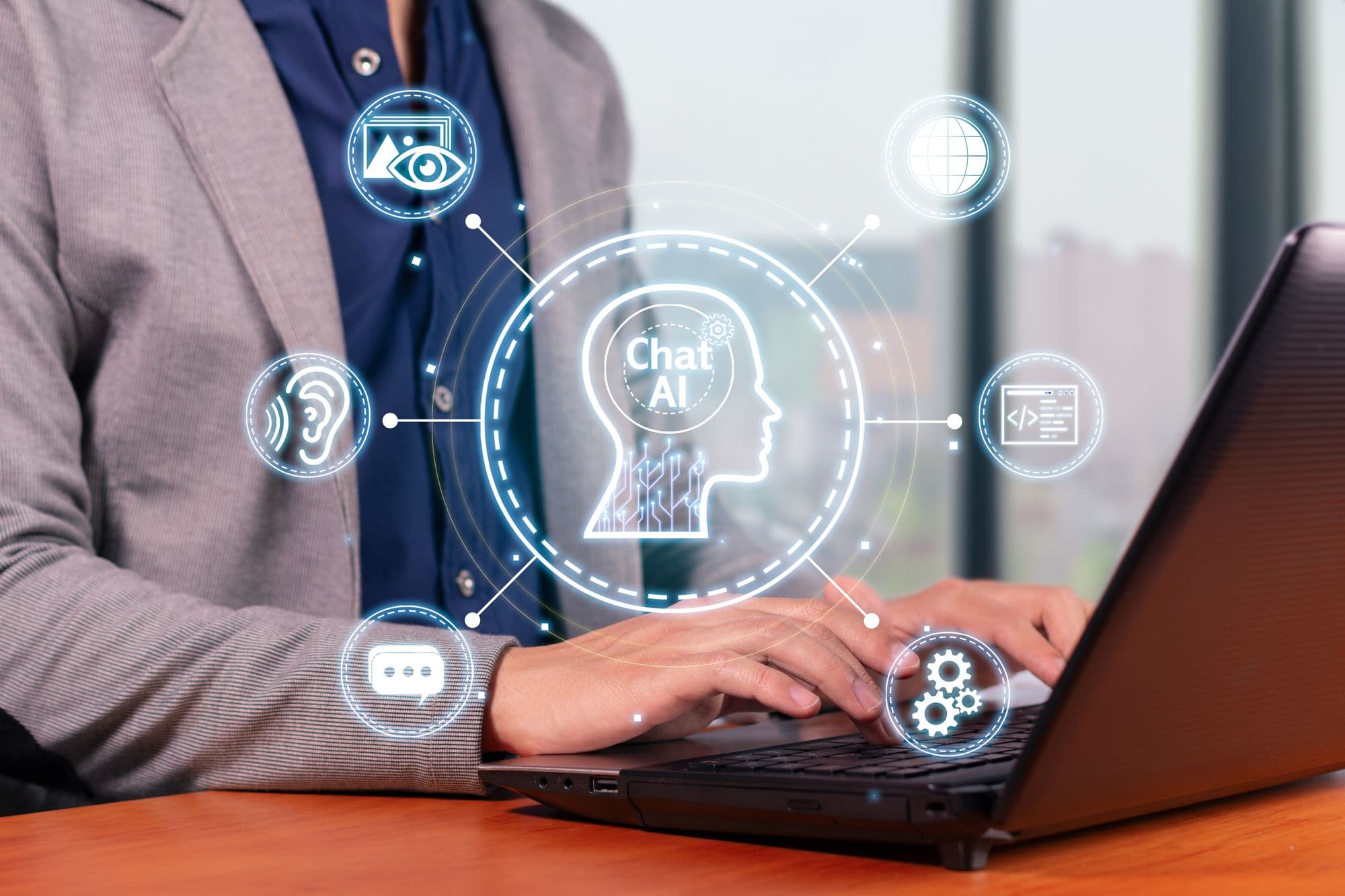 Man typing on a laptop with an AI chat interface and automation icons
